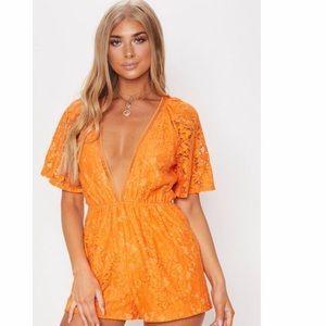 PrettyLittleThing Orange Deep V-Neck Romper